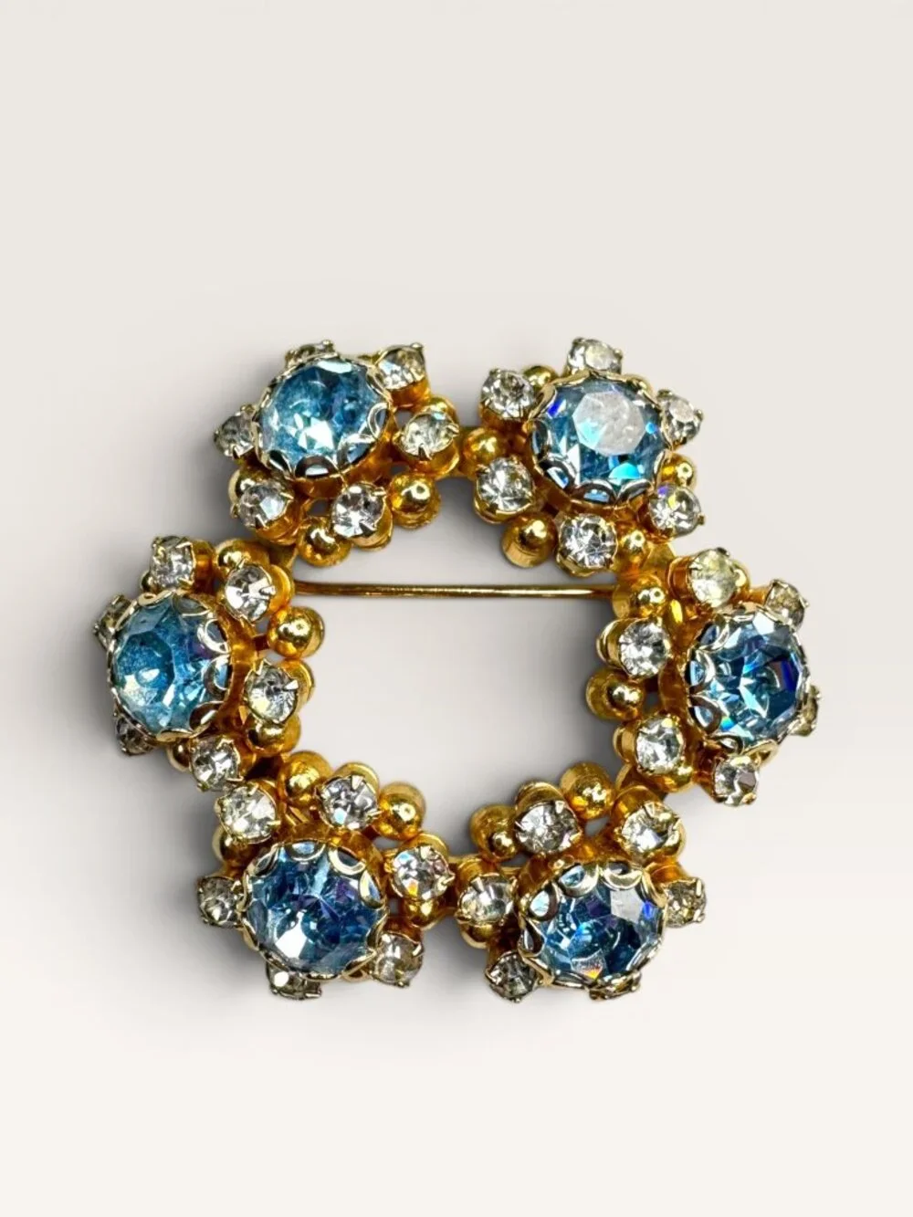 1950s Mid Century Blue Crystal Wreath Brooch Gold Tone Floral Vintage